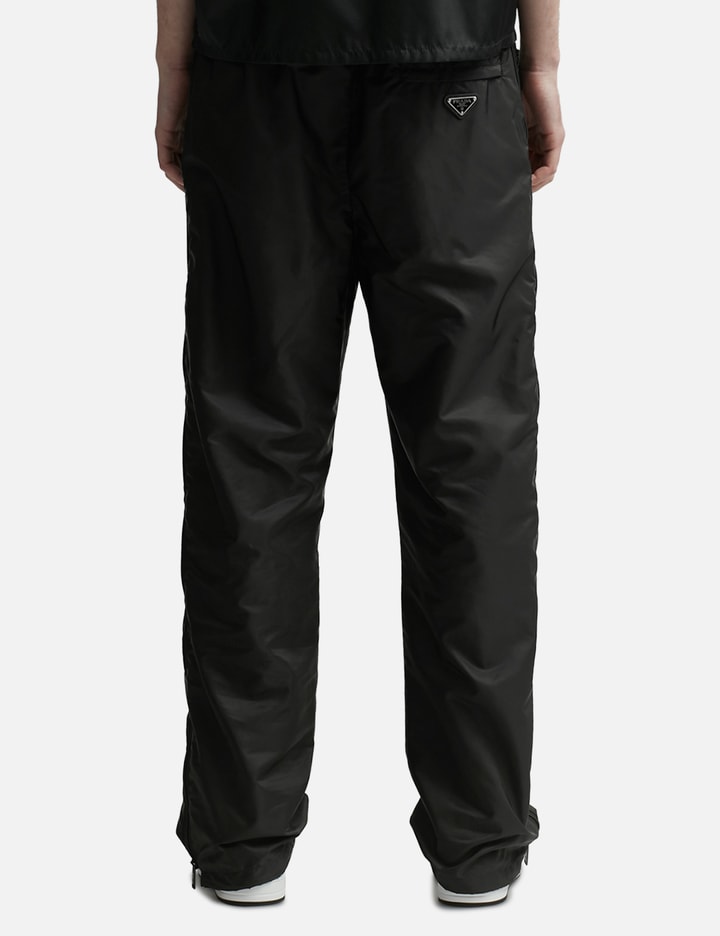 Prada - RE-NYLON SIDE ZIP PANTS | HBX - Globally Curated Fashion and ...