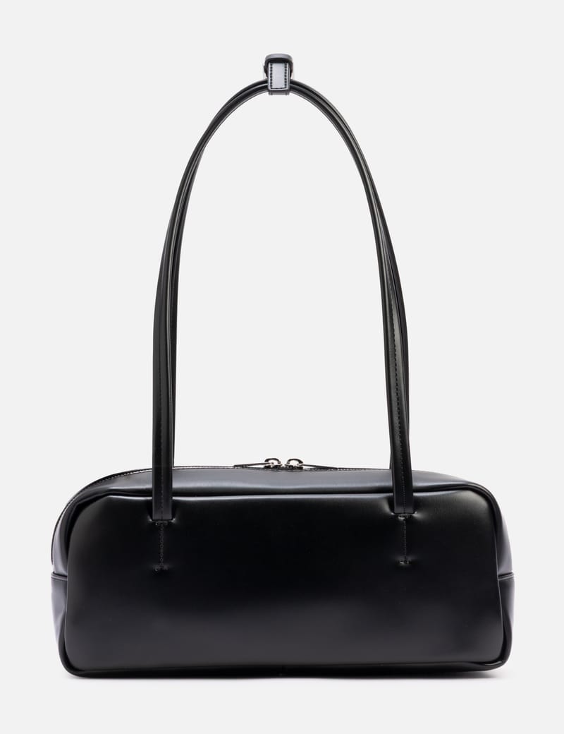 STAND OIL More Baguette Bag - Sleek black faux-leather baguette