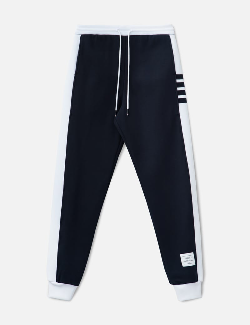 THOM BROWNE トラックパンツ ストライプ トム ブラウン - 4-BAR ストライプ トラックパンツ | HBX