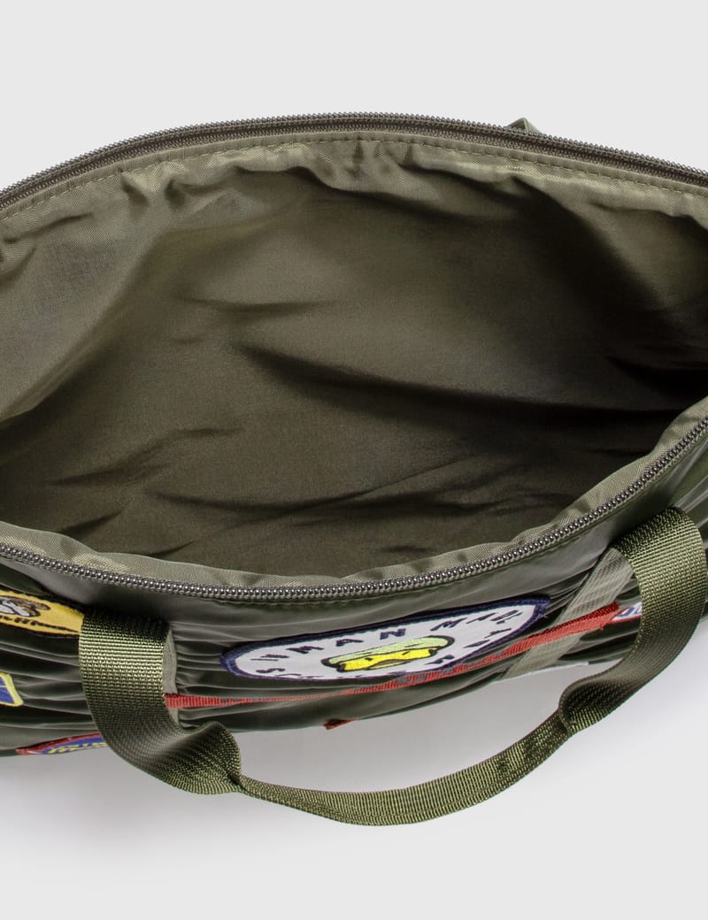 Human Made - HELMET BAG | HBX - Globally Curated Fashion and