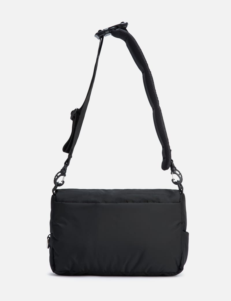 CLESSTE PADDED FLAP HOLIDAY BAG - Padded nylon bag with magnetic