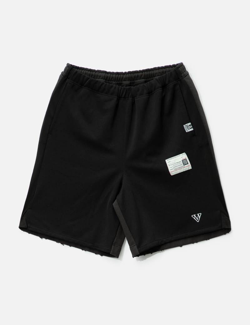 Maison Mihara Yasuhiro Combined Shorts - Wide black shorts with