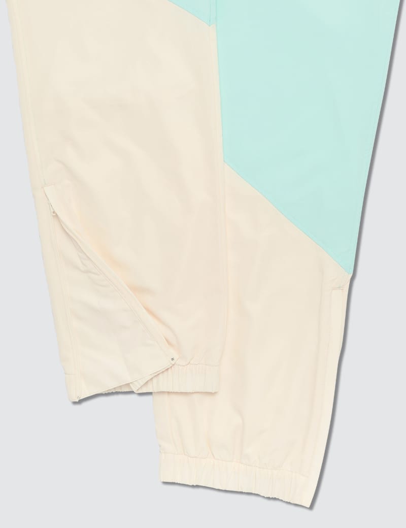 Lacoste - GOLF Le FLEUR* X Lacoste Colorblock Trackpants | HBX