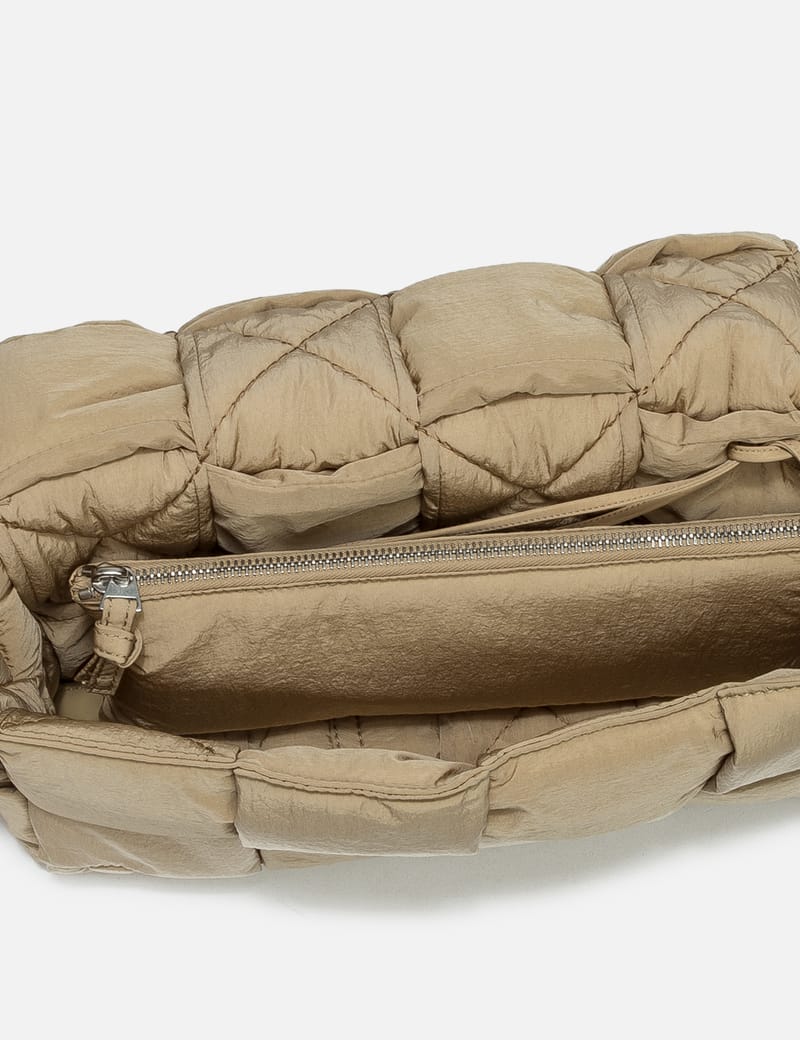 Bottega Veneta - Padded Tech Cassette Bag | HBX - Globally Bottega Veneta - Padded Tech Cassette Bag | HBX - Globally