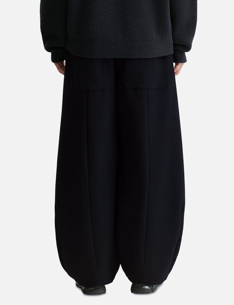 CLESSTE - WOOL MELTON MASSIVE TWISTED PANTS | HBX