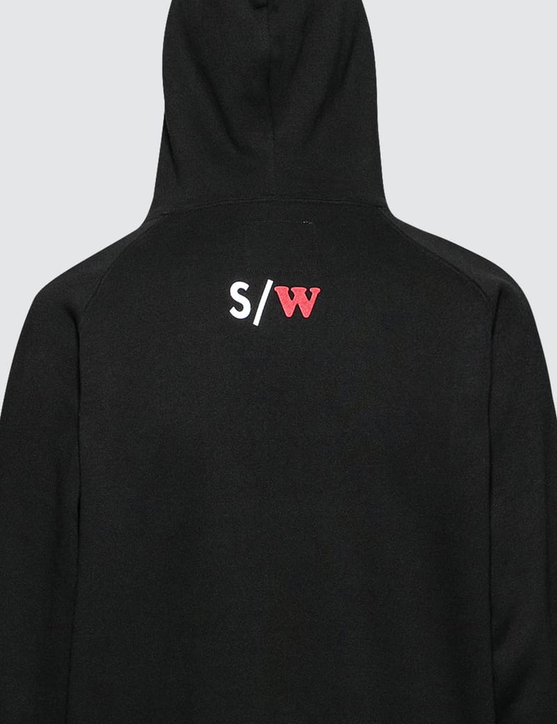 sacai: Black WTAPS Edition Flock Print Hoodie | SSENSE