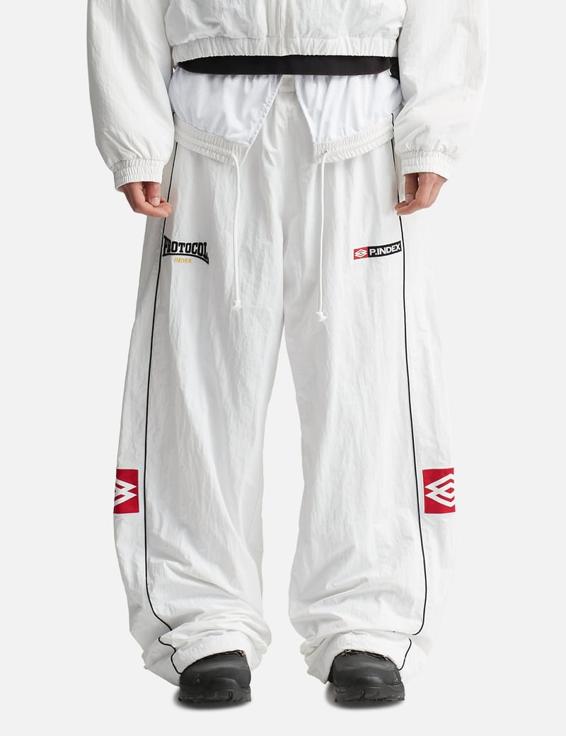 パンツ Protocol Index FOLDED TRACK PANTS Protocol-Index Folded Track Pants - Lightweight nylon joggers with