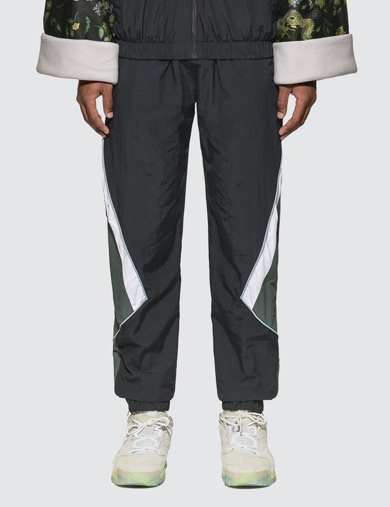韓国ファッション 人気 [LARTIGENT] L14 ROSE TRACK PANTS Martine Rose - Panelled Track Pants | HBX - Globally Curated