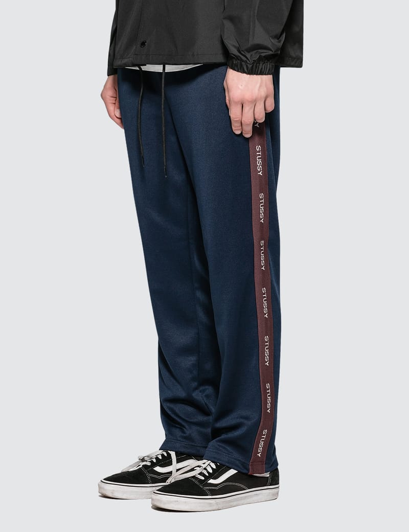 Stüssy - Poly Track Pants | HBX - Globally Curated Fashion and