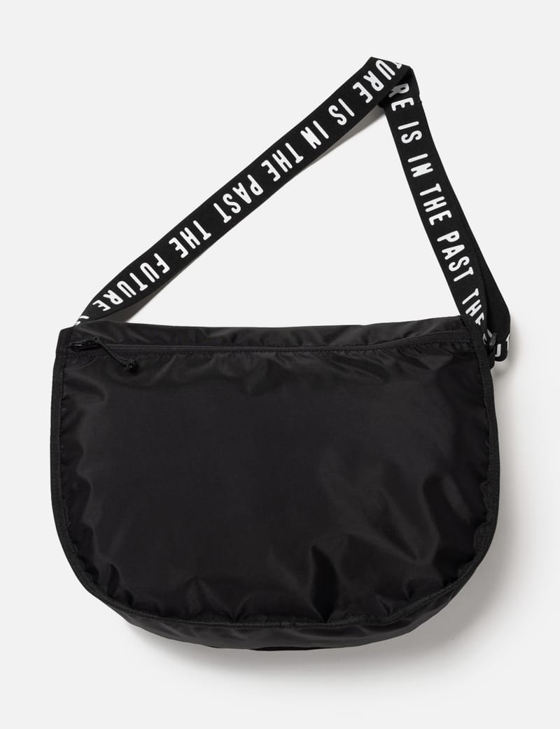 Human Made Shoulder Bag - Black nylon bag with logo strap and A4