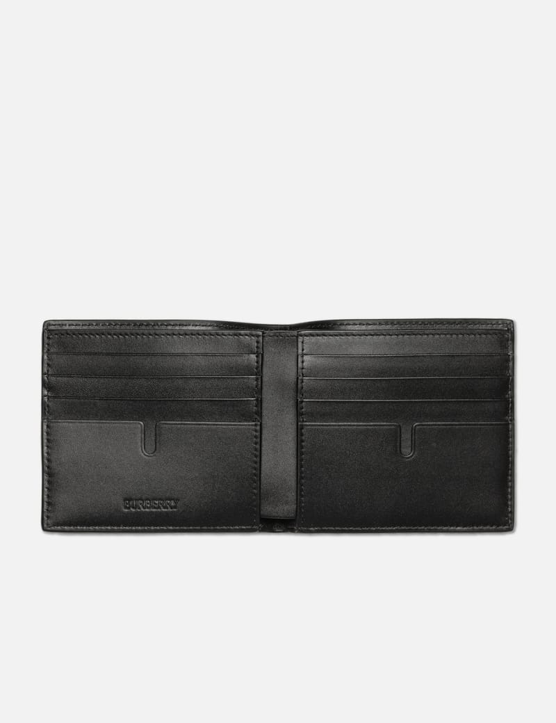 Burberry embossed check sales leather folding wallet