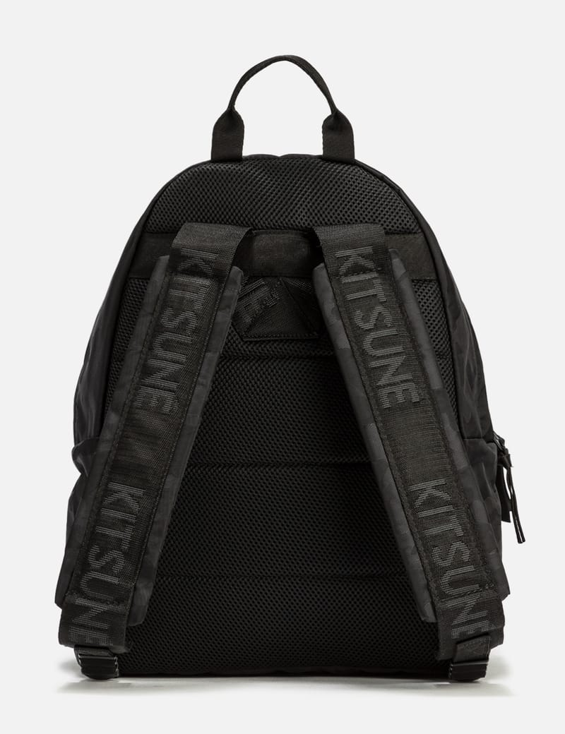 Maison kitsune eastpak backpack best sale