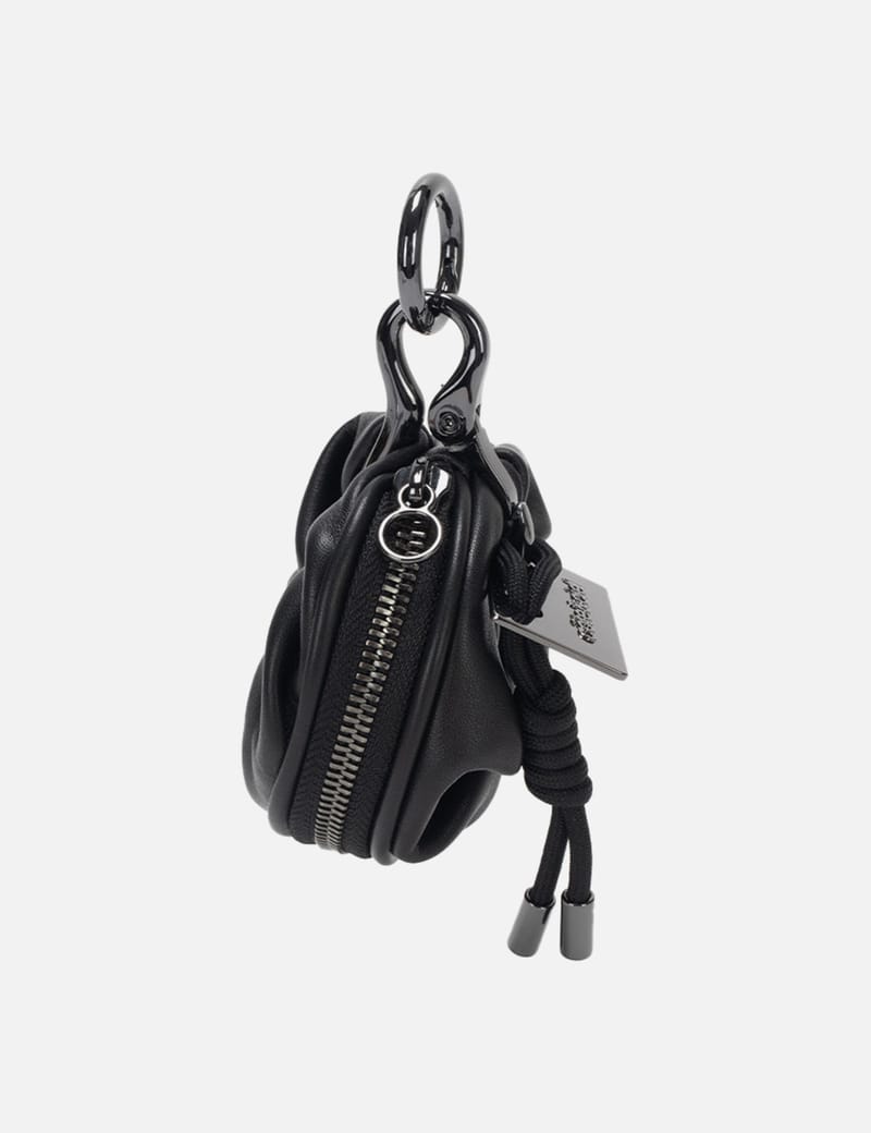 côte&ciel AÓOS NANO ALIAS LEATHER - Compact leather pouch for