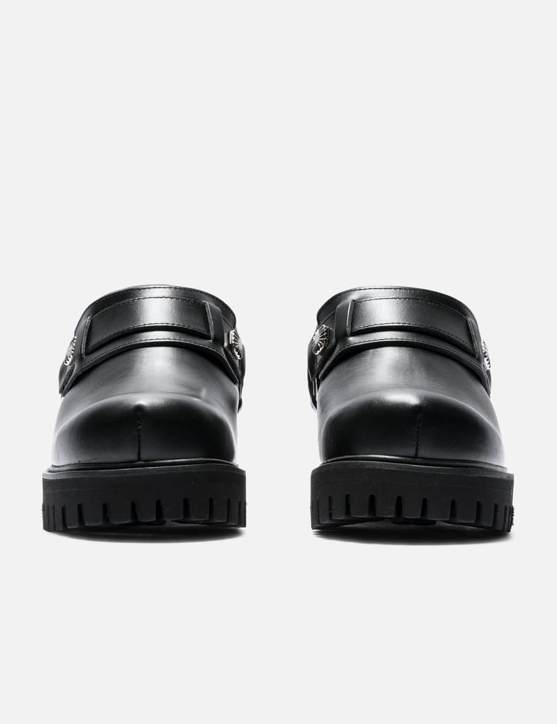 Toga Virilis Black Leather Mules - Studded slip-on style with a