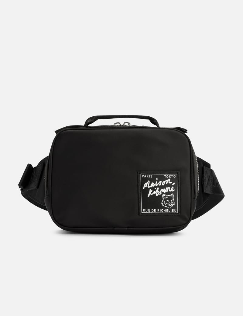 メゾンキツネ THE TRAVELLER BUMBAG Maison Kitsuné - The Traveller Bumbag | HBX - Globally