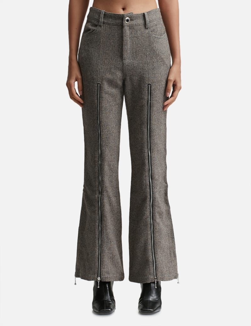 Andersson Bell - AIKA HERRINGBONE ZIP-UP BELL PANTS | HBX