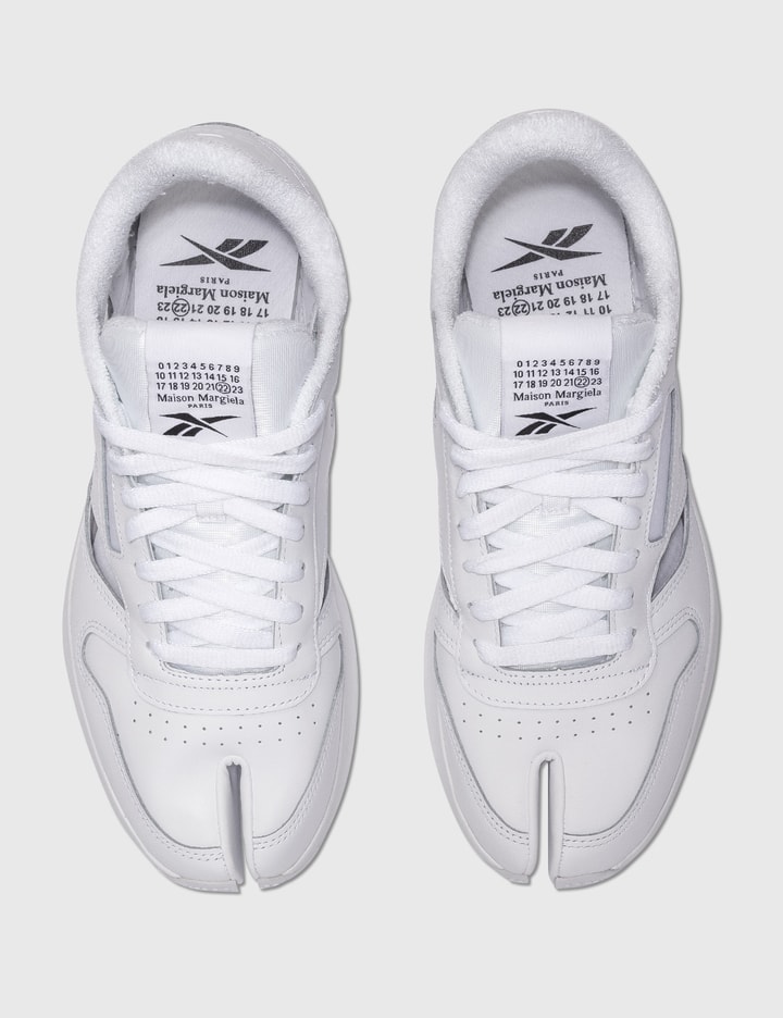 Maison Margiela - Maison Margiela x Reebok Tabi Cut-Out Sneakers | HBX - Globally Curated