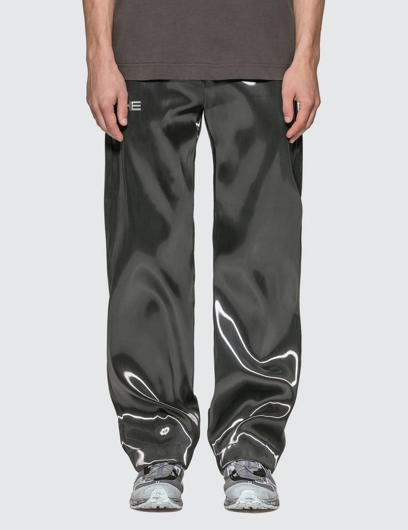 Heliot Emil - Liquid Metal Suit Pants | HBX - HYPEBEAST 為您搜羅