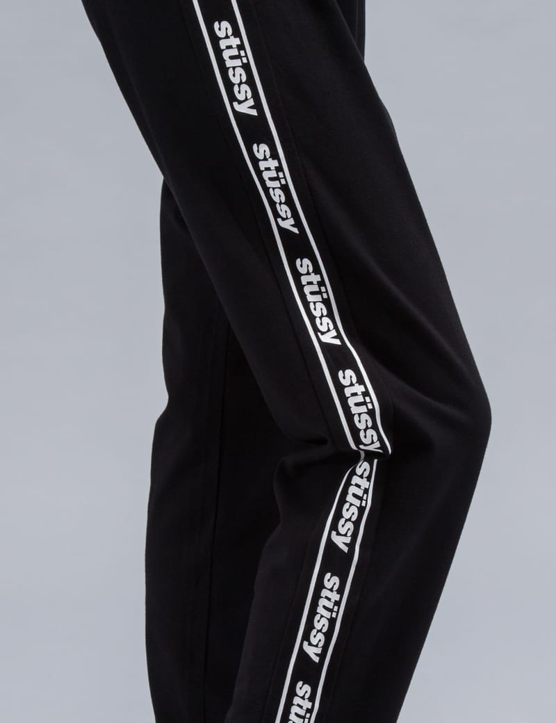 Stüssy - Challenge Track Pants | HBX - Globally Curated