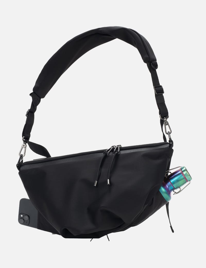 côte&ciel Orne Onyx - 10L water-repellent black crossbody with