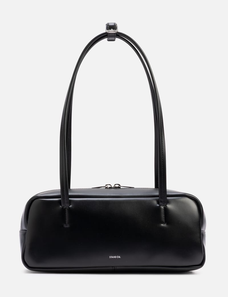 STAND OIL More Baguette Bag - Sleek black faux-leather baguette