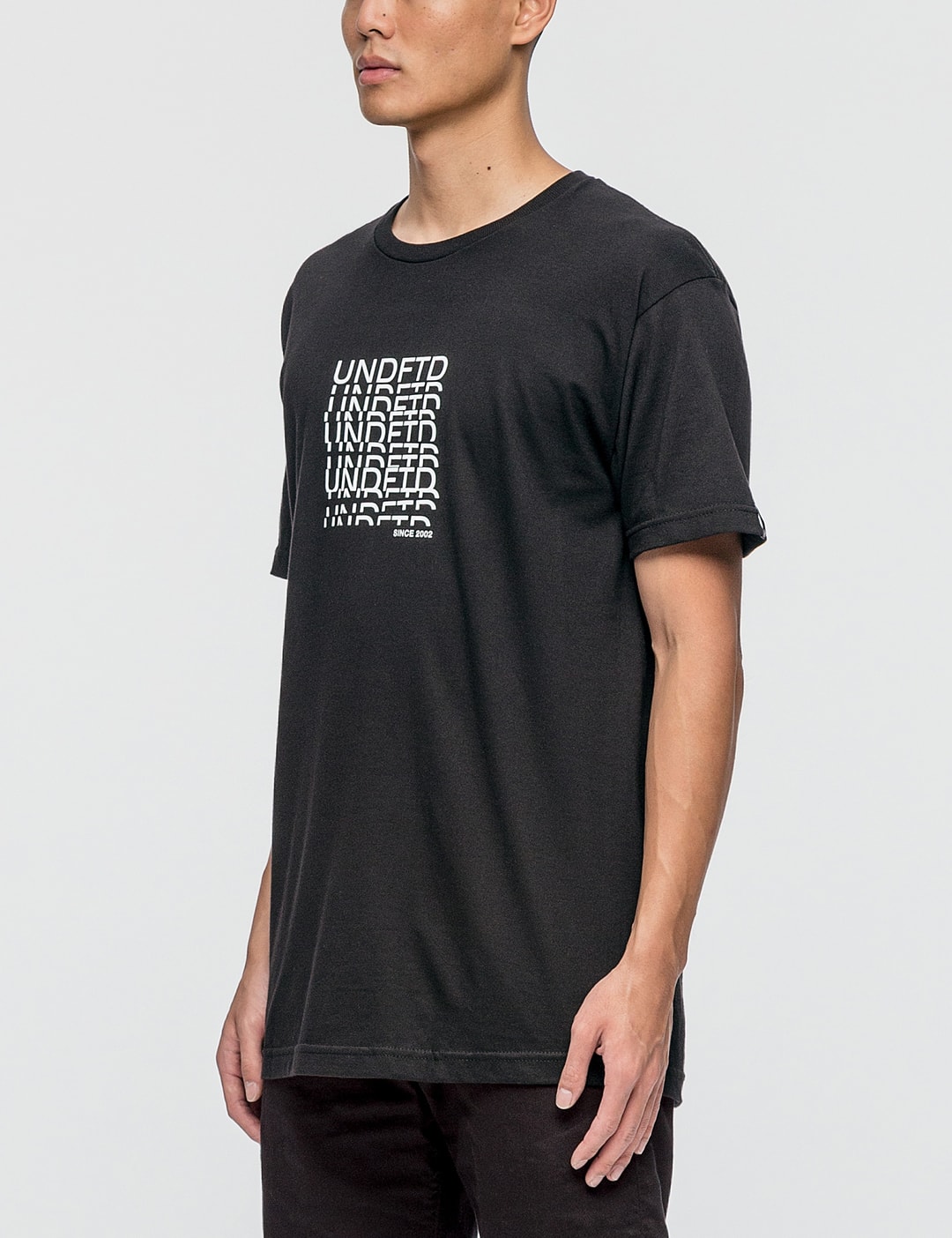 Undefeated - Undercut T-Shirt | HBX - Globally Curated Fashion and ...