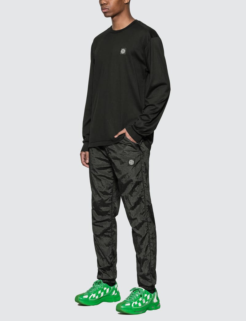 Stone Island - Nylon Metal Ripstop Pants | HBX - HYPEBEAST 為您