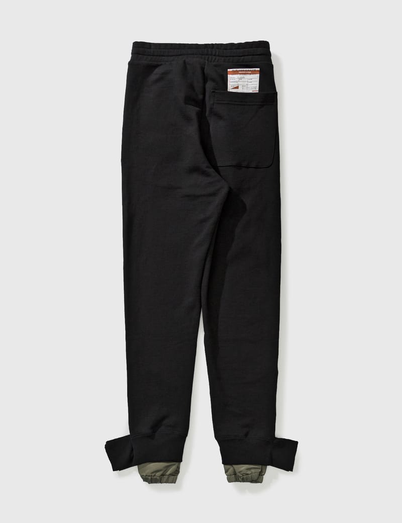 Maison Mihara Yasuhiro - Hem Layered Pants | HBX - Globally