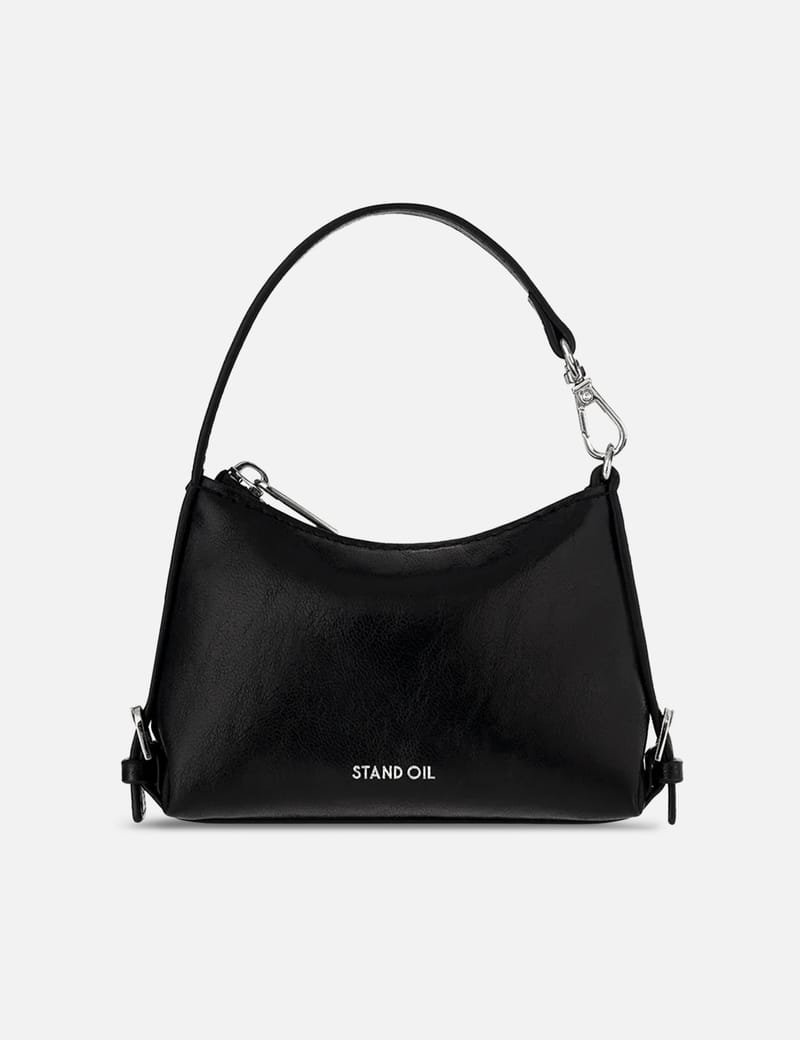 STAND OIL More Baguette Bag - Sleek black faux-leather baguette