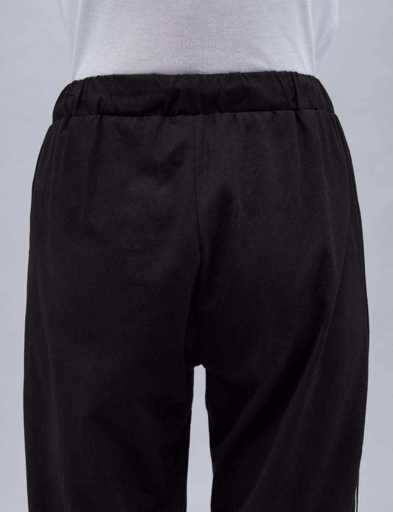 Stüssy - Challenge Track Pants | HBX - Globally Curated