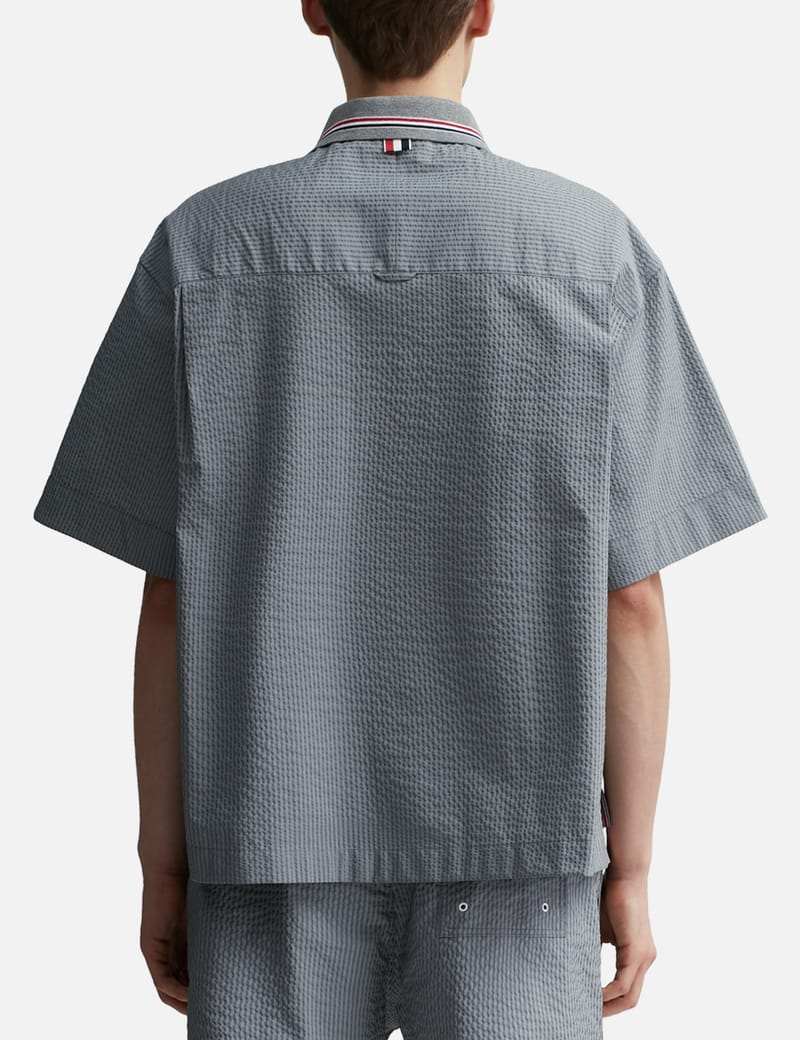 Thom Browne - Step Hem Short Sleeve Rugby Shirt | HBX
