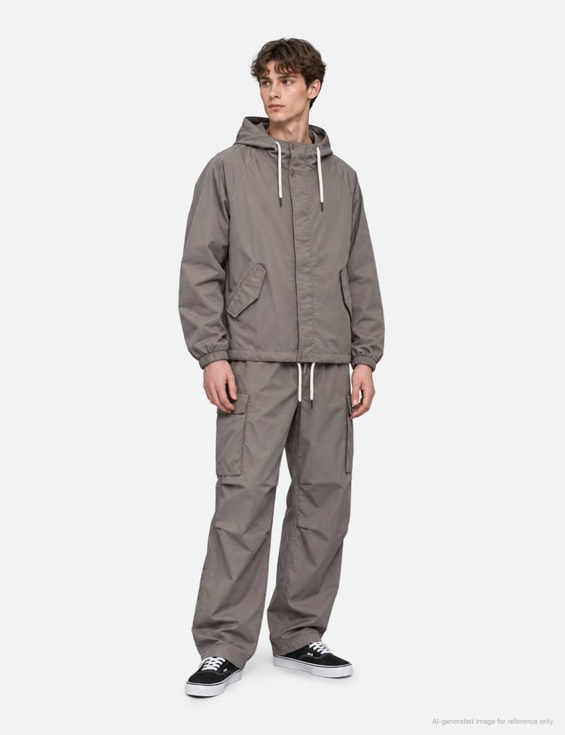 Nanamica Hooded Jacket - Roomy beige outerwear with water
