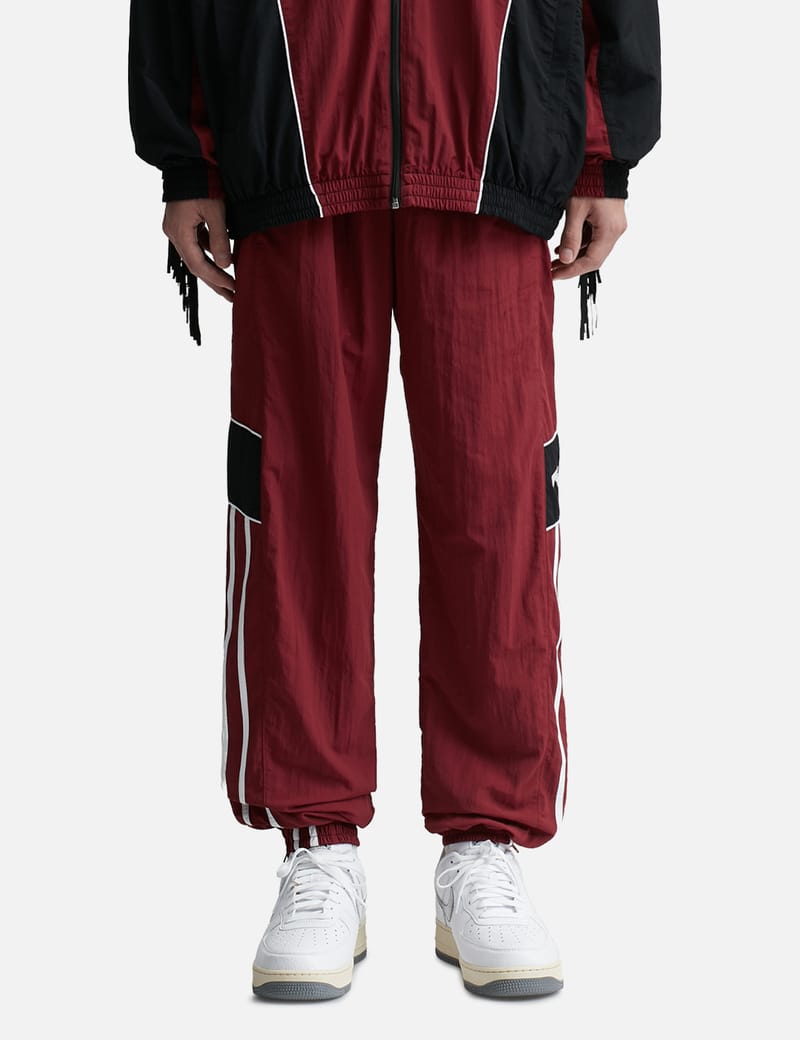 Martine Rose - PANELLED TRACK PANTS | HBX - Globally Curated