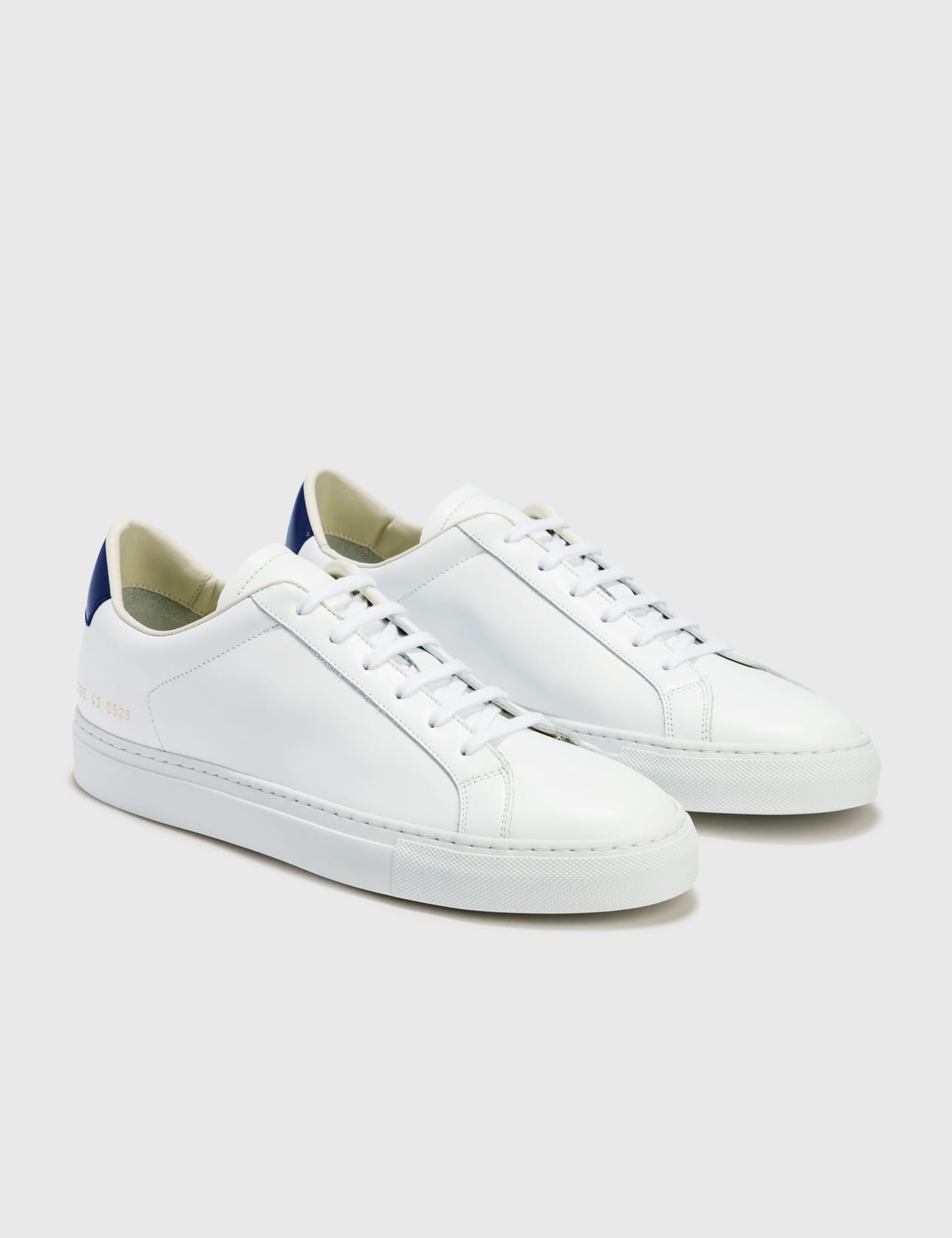 Common Projects - Retro Low Sneakers | HBX - Globally Curated 