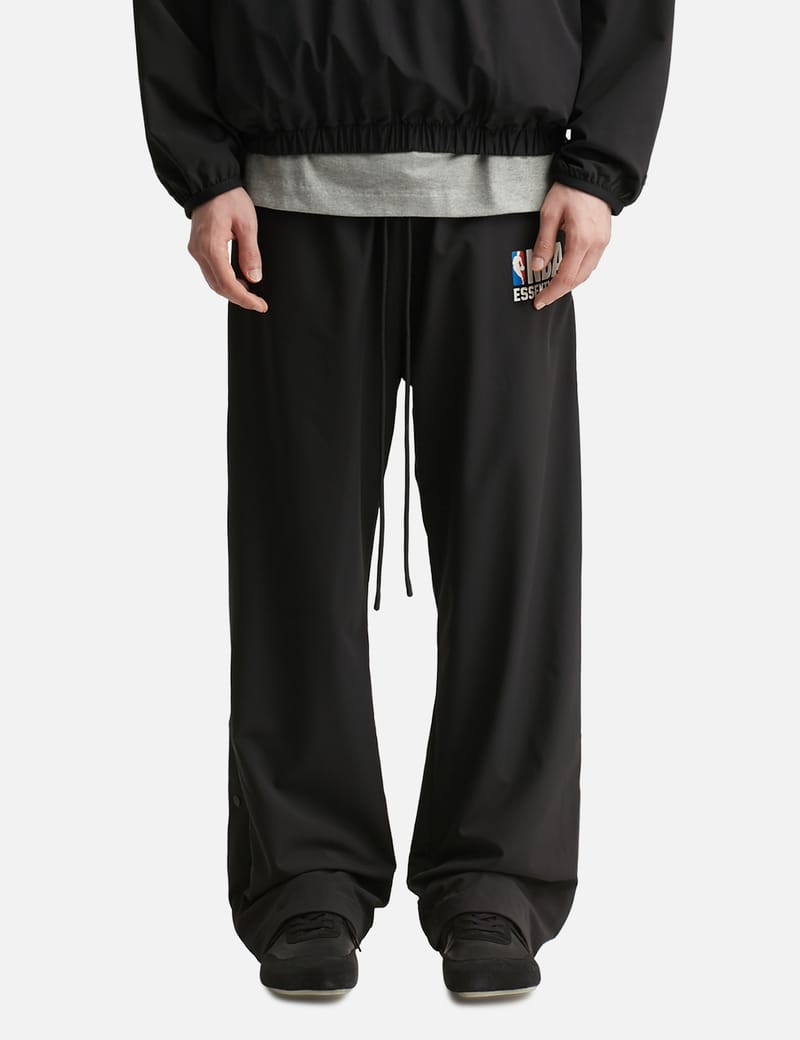 Fear of God Essentials NBA Nylon Tearaway Pant - Black wide-leg