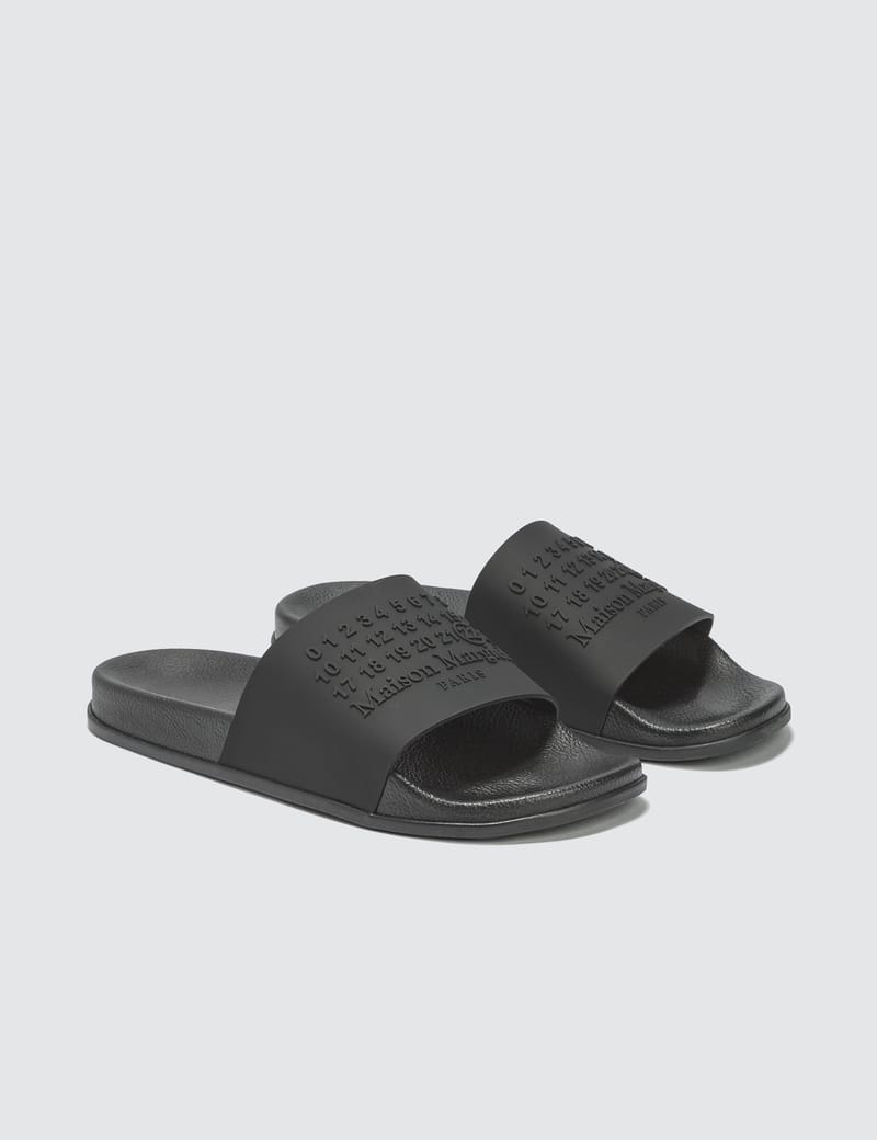 Maison Margiela - Logo Slides | HBX - Globally Curated Fashion and