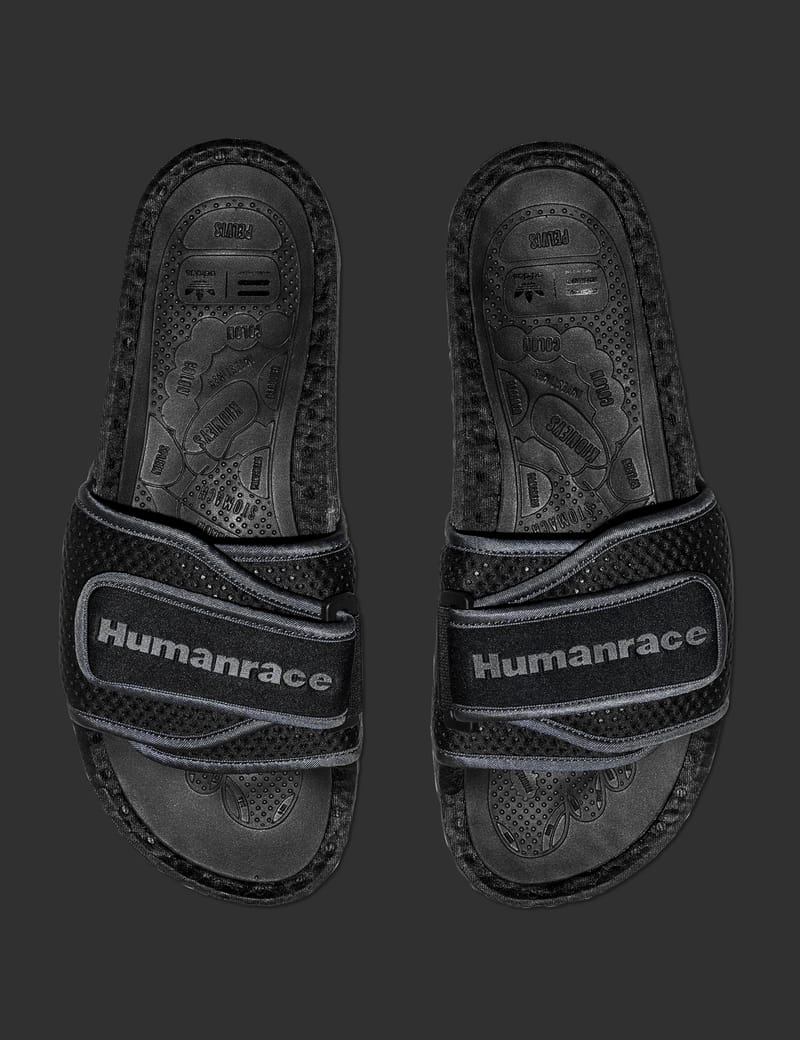 Human race hot sale adidas slides