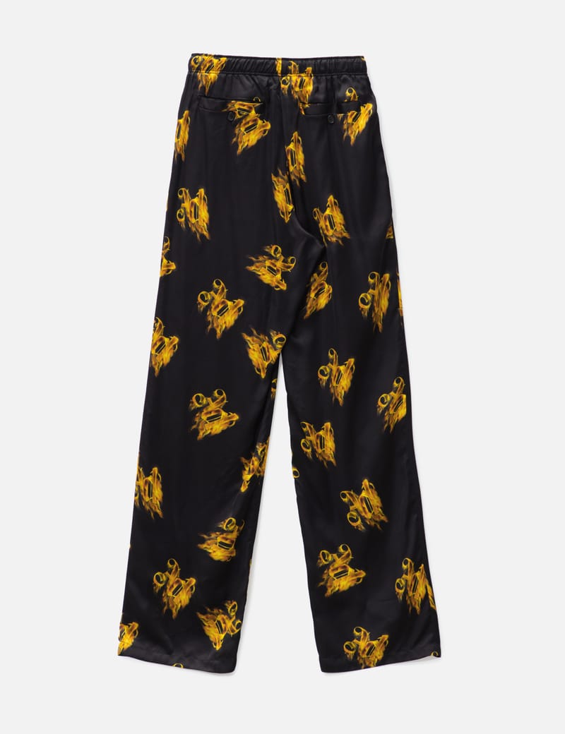 Palm Angels - BURNING MONOGRAM LOOSE PANTS | HBX - Globally