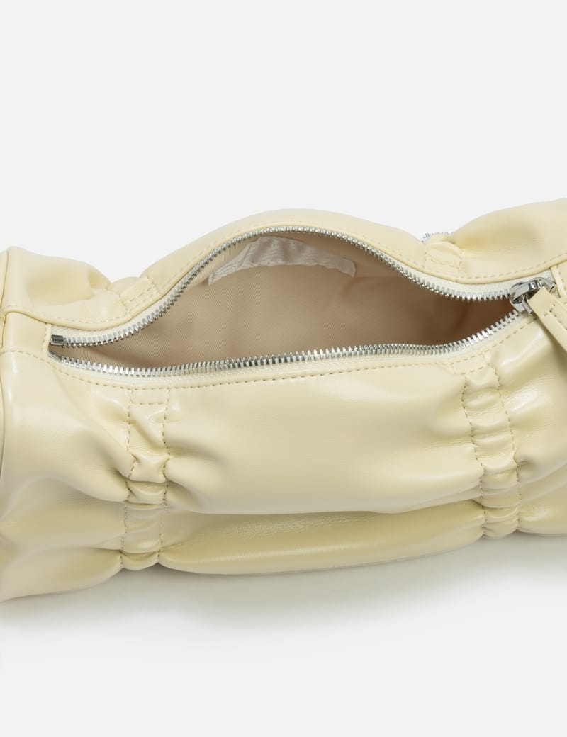 STAND OIL Pleats Bag - Crinkled faux-patent leather shoulder bag