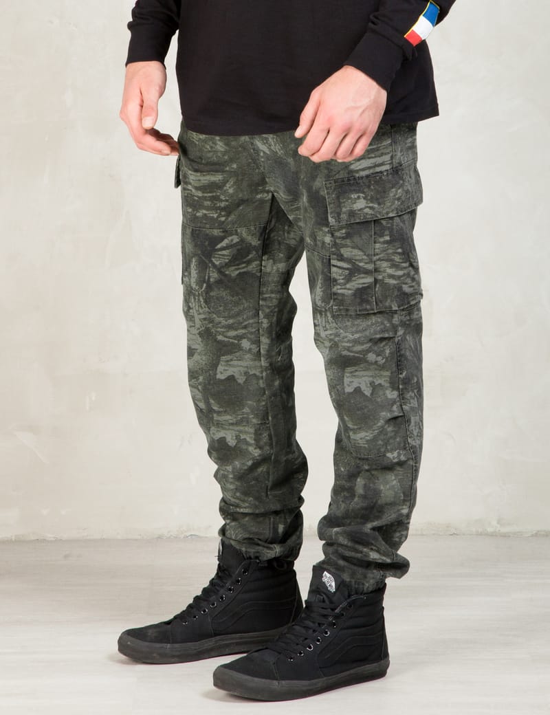 Stüssy - Olive Tree Camo Cargo Pants | HBX