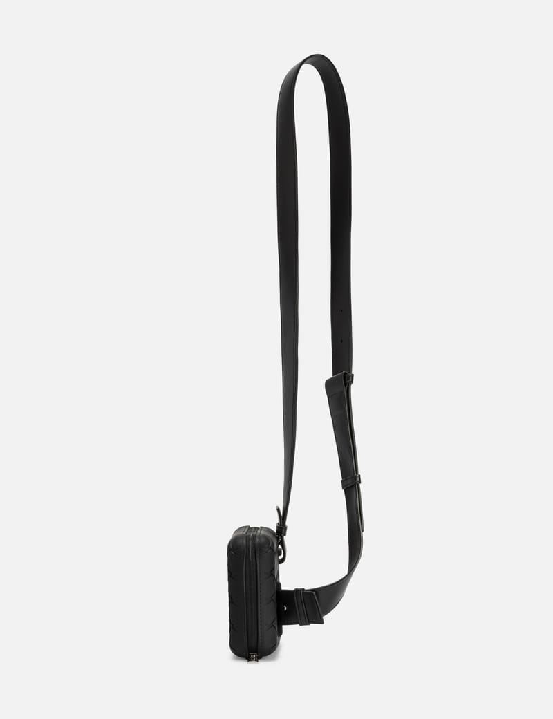 Bottega Veneta - Tech Rubber Clutch | HBX - Globally Curated