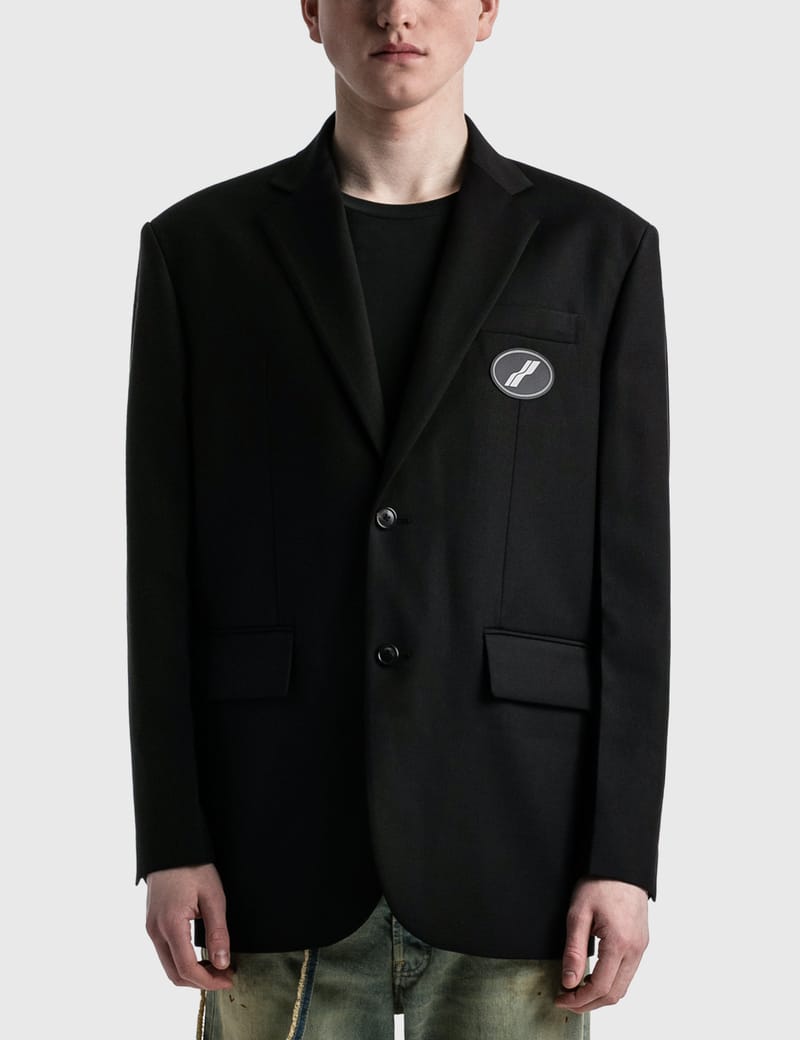 We11done - オーバーサイズ スーツ ロゴ ブレザー | HBX