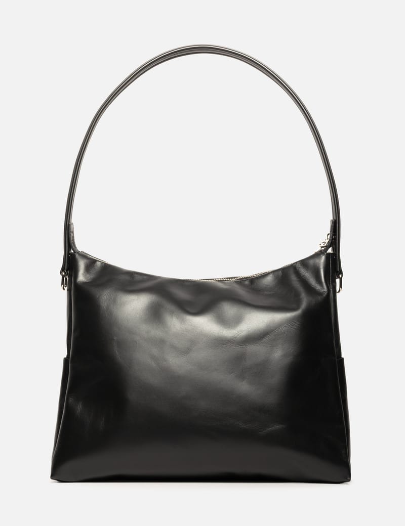 CLESSTE Leather Nomad Bag - 黑色柔軟牛皮旅行包，多隔層設計與堅固