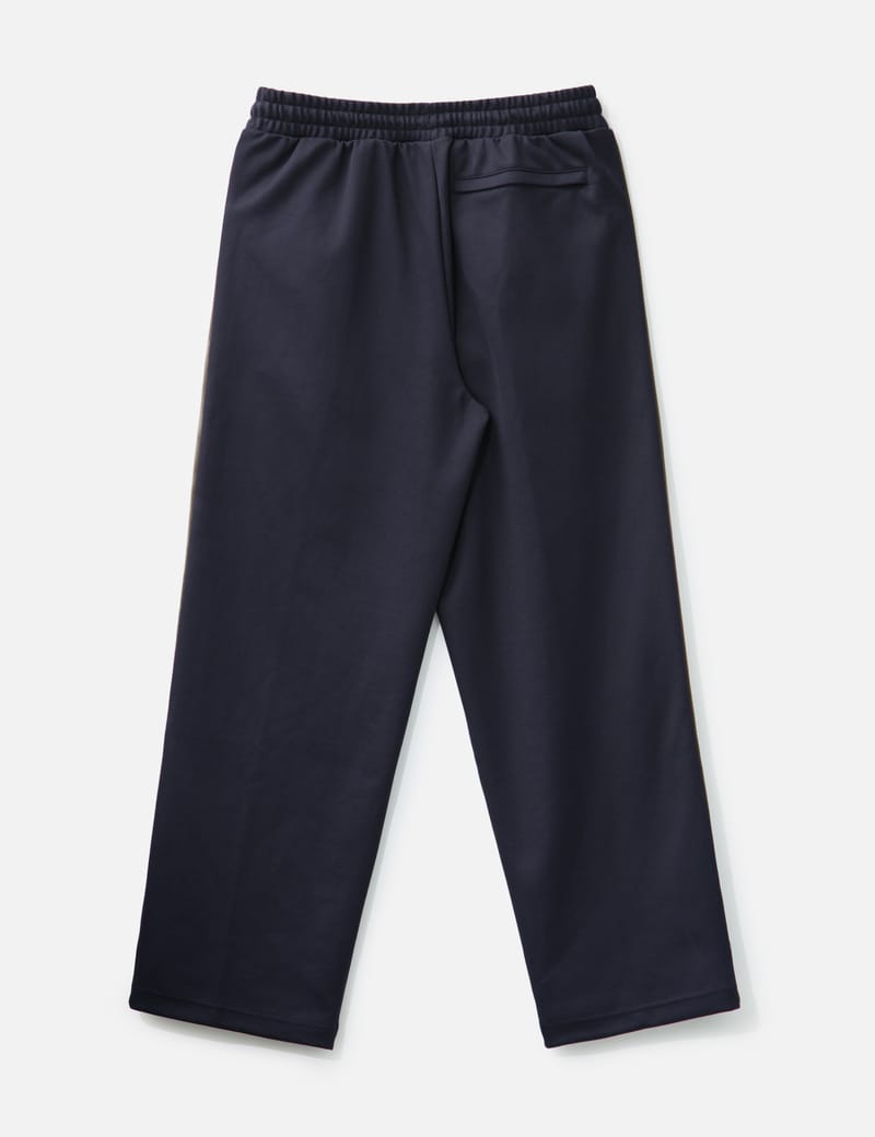 Puma JJJJound x PUMA Track Pants - Navy T7 pants with brown straps