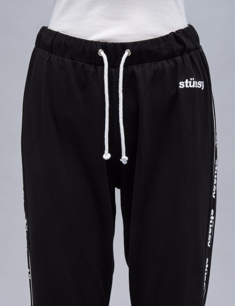 Stüssy - Challenge Track Pants | HBX - Globally Curated