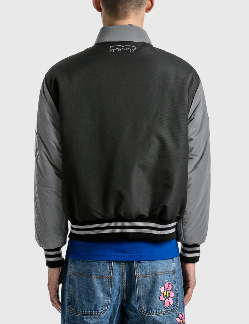 Fucking Awesome - REFLECTIVE VARSITY PUFFER | HBX - Globally