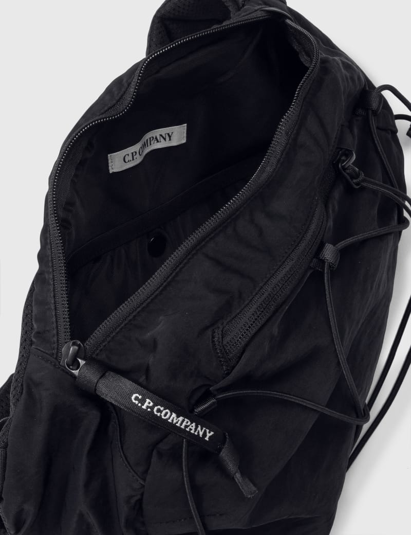 C.P. Company - Nylon B Crossbody Rucksack | HBX - Globally C.P. Company - Nylon B Crossbody Rucksack | HBX - Globally