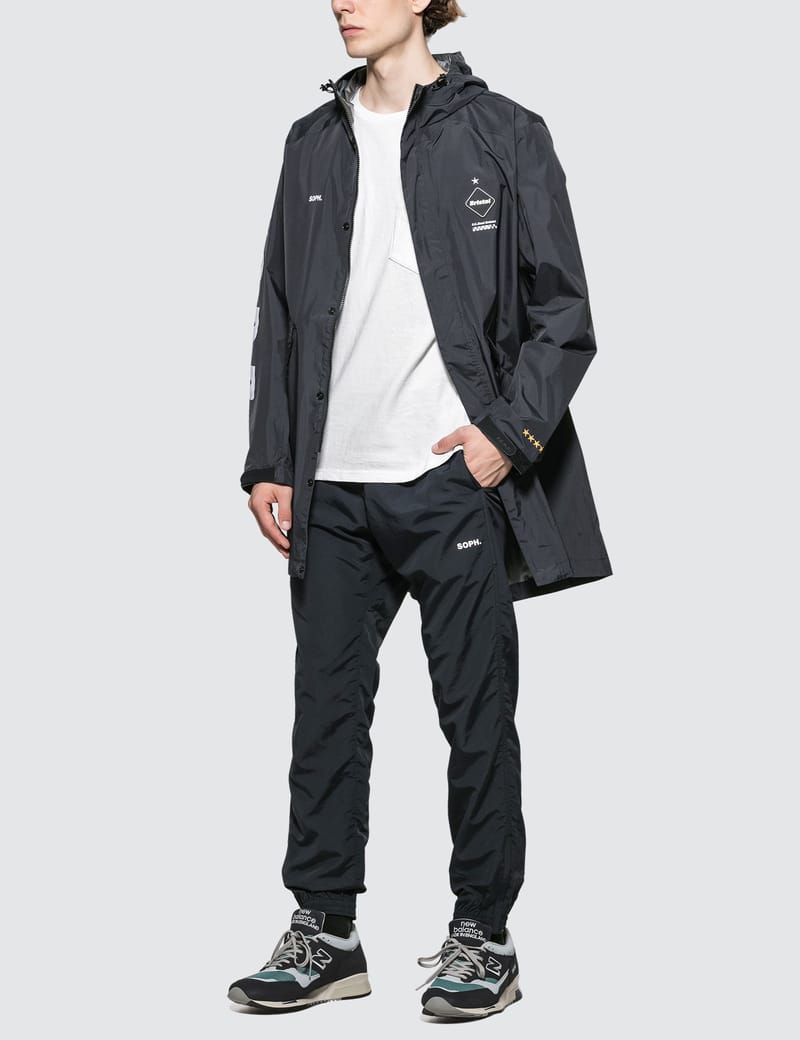 F.C. Real Bristol - Bench Rain Coat | HBX - Globally Curated