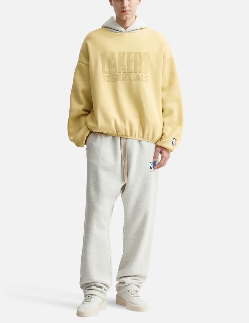 Fear of God Essentials - Essentials Lakers Hoodie | HBX Fear of God Essentials - Essentials Lakers Hoodie | HBX