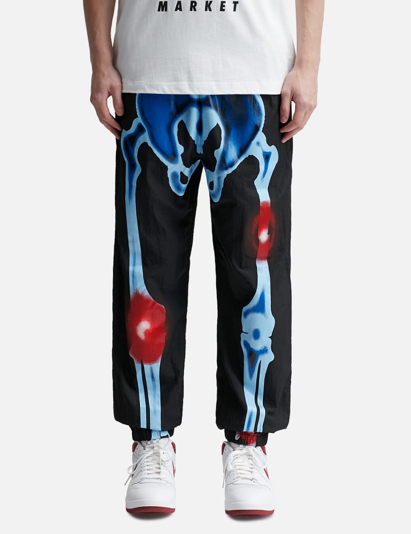 Market - Injuries Track Pants | HBX - Globally Curated Fashion and